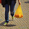 What are the positive effects of reusing plastic bags?